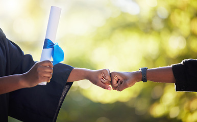 Image showing Graduation, education and hands of friends fist bump in celebration of certificate, study and success on bokeh. University, people and hand in support of goal, motivation and unity in accomplishment