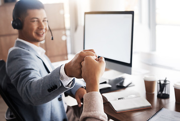 Image showing Customer support fist bump, consulting or man celebrate telemarketing on contact us CRM or ERP telecom. Japan call center, online ecommerce team or information technology consultant happy for success