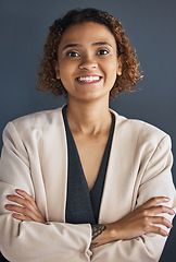 Image showing Business woman, face and arms crossed in portrait, happy with success and vision on studio background. Professional mindset, Mexican employee and growth, career goals with leadership in Mexico office