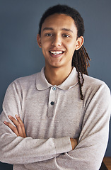 Image showing Portrait, vision and mindset with a business black man on a gray background, standing arms crossed. Growth, mission and motivation with a young male employee looking confident of his future success