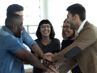 Image showing Teamwork, success and happy with hands of business people in office and celebration for motivation, winner and solidarity. Diversity, collaboration and trust with group for goal, community and focus