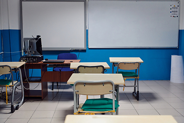 Image showing Empty chairs in classrom. Modern furniture. Interior of cafe. Conference hall.