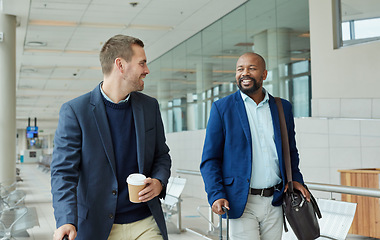 Image showing Travel for work, business men at airport for flight abroad and team, conversation with conference or seminar. Diversity, partnership and walk with talk, professional trip for architecture convention