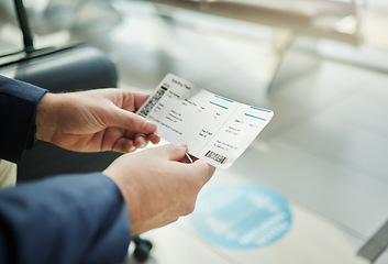 Image showing Plane ticket in hands, travel and person at airport, waiting on flight for business trip, check in and boarding. Closeup, .professional conference or convention with travelling for work and journey