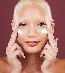 Image showing Skincare, beauty and portrait of woman with cream on face, cosmetics and makeup on studio background. Dermatology, spa facial treatment and model isolated with mock up, anti ageing care and glow.