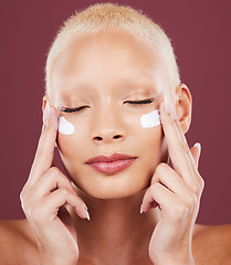 Image showing Skincare, beauty and portrait of woman with closed eyes and cream, cosmetics and skin product on studio background. Dermatology, facial treatment and model isolated with mockup and anti ageing glow