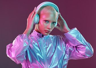 Image showing Holographic fashion, woman portrait and music headphones for hologram trend isolated in studio. Futuristic, vaporwave and electronic art with cyberpunk model face for retro cosmetics and audio sound