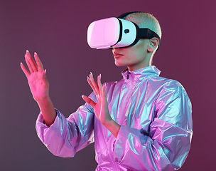 Image showing Virtual reality glasses, woman and metaverse for futuristic gaming, digital transformation and tech. Cyberpunk person hands on studio background with vr headset for 3d and cyber world user experience