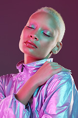 Image showing Holographic fashion, woman face and makeup glow for hologram trend isolated in studio. Futuristic, vaporwave and art color jacket on cyberpunk aesthetic model person for retro cosmetics shine on skin