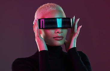 Image showing Woman, vr glasses and metaverse for futuristic gaming, digital transformation and tech. Cyberpunk person on studio background with augmented reality headset for 3d and cyber world fantasy experience