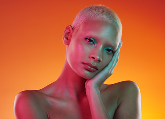 Image showing Art, neon beauty and portrait of woman with makeup and light in creative advertising on orange background. Cyberpunk, unique face and model isolated for skincare and futuristic mockup in studio