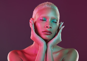 Image showing Skincare, beauty and eyes closed, woman with neon makeup and lights for creative advertising on studio background. Cyberpunk, product placement and model isolated for skin care and futuristic mockup.