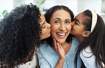 Image showing Portrait, cheek kiss and grandmother with family, daughter and granddaughter at home together. Face, love and care of happy mother, senior woman and kid kissing, bonding and laughing on mothers day.