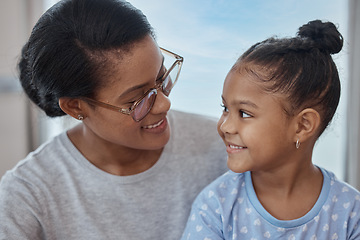 Image showing Happy, smile and relax with mother and girl for bonding, quality time and affectionate. Happiness, care and support with mom and daughter at home for black family, smiling and cute together