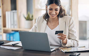 Image showing Finance, credit card and payment with woman and laptop in office for savings, budget planning or online shopping. Technology, fintech and retail with customer and website for deal, ecommerce or offer