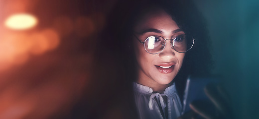 Image showing Business, black woman and phone communication at night for contact, typing or networking app. Female employee working late on smartphone, dark bokeh background or glasses to search internet on mockup