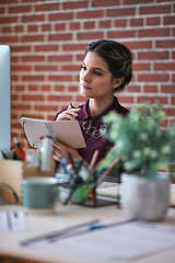 Image showing Business woman, notebook and thinking of employee with web design planning. Digital designer, working and worker with notes at a office desk with ideas for website and ux project for startup