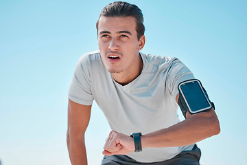 Image showing Smart watch, outdoor fitness and man tired from exercise workout, training and run. Stopwatch time, sports person and breathing for heart rate, healthy body progress and monitor wellness on data app