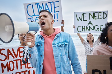 Image showing Protest, climate change and megaphone with man at the beach for environment, earth day and action. Global warming, community and stop pollution with activist for social justice, support and freedom