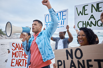 Image showing Protest, global warming and megaphone with man at the beach for environment, earth day and action. Climate change, community and pollution with activist for social justice, support and freedom