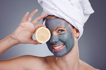 Image showing Lemon, face mask and portrait of woman, healthy skincare and beauty of anti aging wellness makeup in studio. Happy female model, citrus fruits and food for vitamin c, aesthetic facial and shower glow