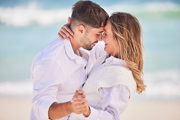 Image showing Love, dance and happy with couple on beach for date, romance and anniversary celebration. Smile, bonding and affectionate with man and woman on holiday for hug, vacation and happiness together