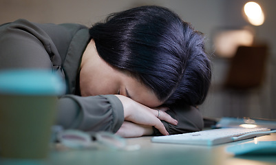 Image showing Tired, sleeping woman at her computer at night for depression, burnout and mental health risk. Business person, worker or employee fatigue, low energy and depressed sleep on pc for project deadline