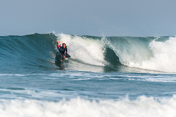 Image showing Bodyboarder surfing ocean wave