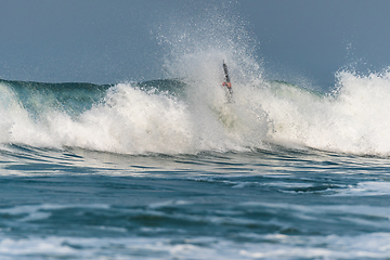 Image showing Bodyboarder surfing ocean wave