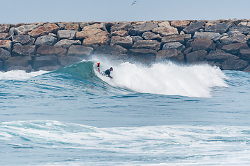 Image showing Bodyboarder surfing ocean wave