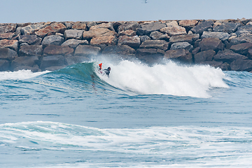 Image showing Bodyboarder surfing ocean wave