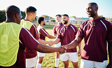 Image showing Man, sports and handshake for team greeting, introduction or sportsmanship on the grass field outdoors. Sport men shaking hands before match or game for competition, training or workout exercise