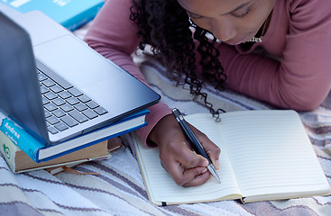 Image showing Student, studying and woman writing notes from research assignment for college or university academic education. Park, learning and African American young female Elearning or remote with a textbook