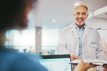 Image showing Nurse, doctor and man at reception with clipboard for health results or information. Healthcare, receptionist and happy senior medical professional with documents, paperwork or wellness checklist.