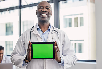 Image showing Doctor, black man and tablet green screen in hospital portrait for mockup with happiness in healthcare. Senior african medic, mock up space or technology ui with smile, clinic office and medical app