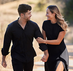 Image showing Love, real couple and date outdoor, marriage and happiness for bonding, dating and relationship. Romance, man and woman with smile, black outfits or celebration for anniversary, joyful or cheerful