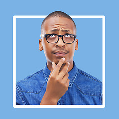 Image showing Confused, thinking and black man in studio with frame, mockup and blue background space. Doubt, unsure and contemplation with a guy thoughtful in border, pensive or emoji collage while isolated