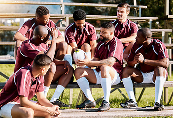 Image showing Sports, fitness and rugby team with ball ready for exercise, training and workout for field practice. Depression, teamwork and sad athletes on stadium stand after match, game and competition loss