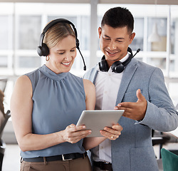 Image showing Call center, customer service and team of consultants on a tablet in the office planning a crm strategy. Telemarketing, ecommerce sales and agents doing research on a mobile device in the workplace.