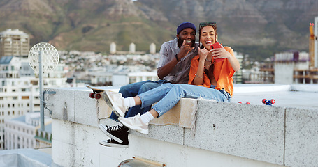 Image showing Selfie, city and interracial couple with smile on a wall during holiday in Morocco for adventure. Happy, young and black man and woman with photo on mobile during travel, vacation and summer together