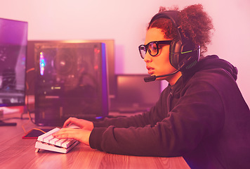 Image showing Video game, young girl and headphones in home for esports, online games and virtual competition. Female gamer, computer live streaming and gaming with headset in neon lighting, tech or gen z streamer