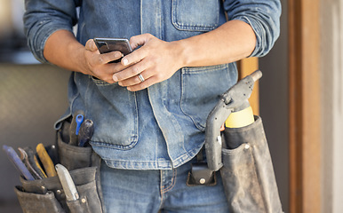 Image showing Closeup, hands and man with smartphone, maintenance and research for instructions, deadline or schedule. Zoom, male or handyman with cellphone, social media or typing for connection or search on site