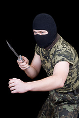 Image showing The man with a knife in a black mask