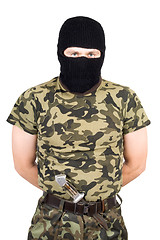 Image showing The man in a black mask over white