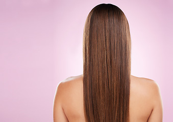 Image showing Hair, beauty and woman with back and haircare, mockup space and keratin treatment on pink background. Cosmetics shine, grooming and hairstyle, dandruff free and cosmetic care with female rear view