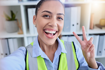 Image showing Selfie, peace sign and woman in office, leadership and happiness for business deal, growth and development. Portrait, female employee and engineer workplace, celebration and gesture for achievement