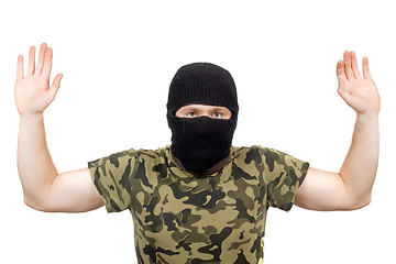 Image showing The surrendered criminal in a black mask over white