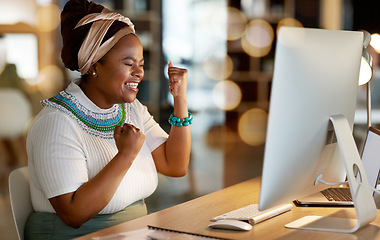 Image showing Business, night and black woman with achievement, fist and computer with email, celebration and success. African American female leader, manager and ceo in workplace, profit growth and website launch