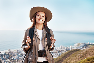 Image showing Travel, portrait and woman photographer in nature, happy and relax on adventure on blue sky background. Face, photography and girl student backpacking, sightseeing and on a solo trip in New york