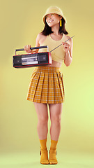 Image showing Radio, vintage and Asian woman with stereo, fashion and lady with trendy outfit against studio background. Japan, female or happy lady with freedom, music or old school style with confidence or retro